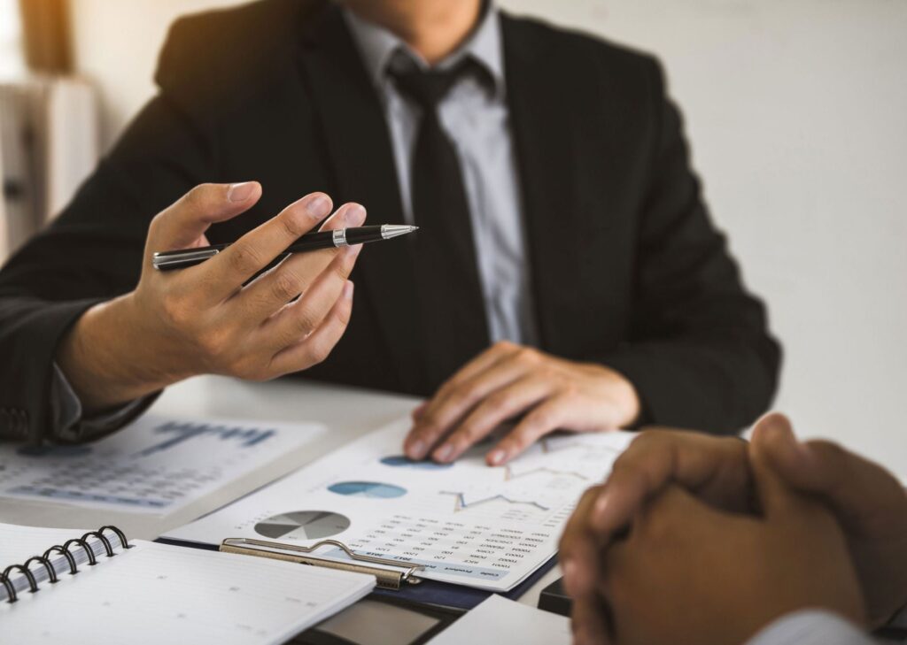 Outsourced CFO reviewing financial performance with an Abu Dhabi business owner
