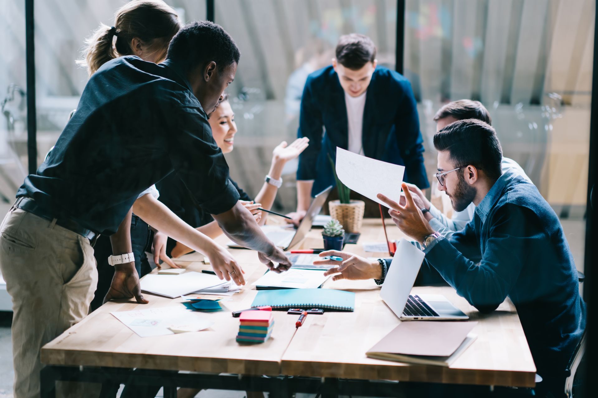Management assessing cash position and commitments in a Sharjah business